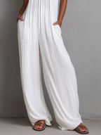 Resort Style White Pleated Halter Wide-Leg One-Piece Jumpsuit